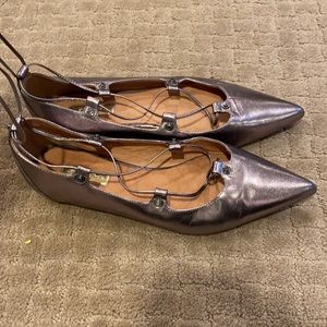 Halogen woman’s flats with leg tie detail.